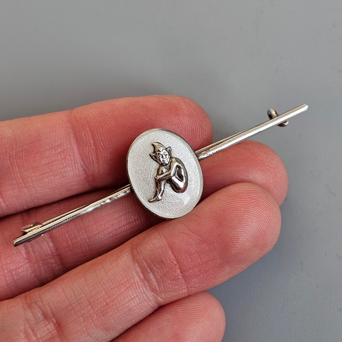 c1920s Bernard Instone Silver Pixie Bar Brooch with White Enamel – Vintage British Art Deco Jewelry