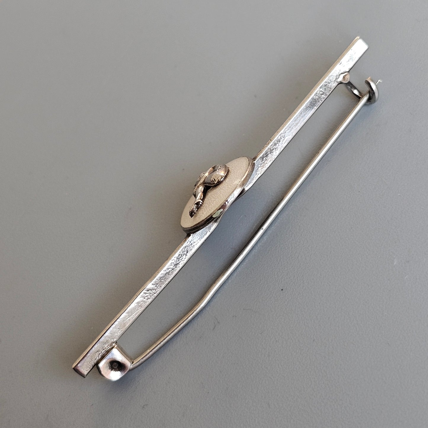 c1920s Bernard Instone Silver Pixie Bar Brooch with White Enamel – Vintage British Art Deco Jewelry