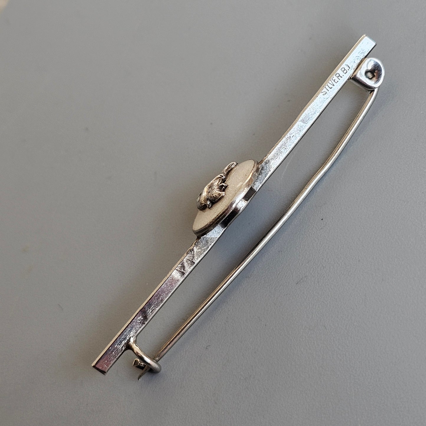 c1920s Bernard Instone Silver Pixie Bar Brooch with White Enamel – Vintage British Art Deco Jewelry