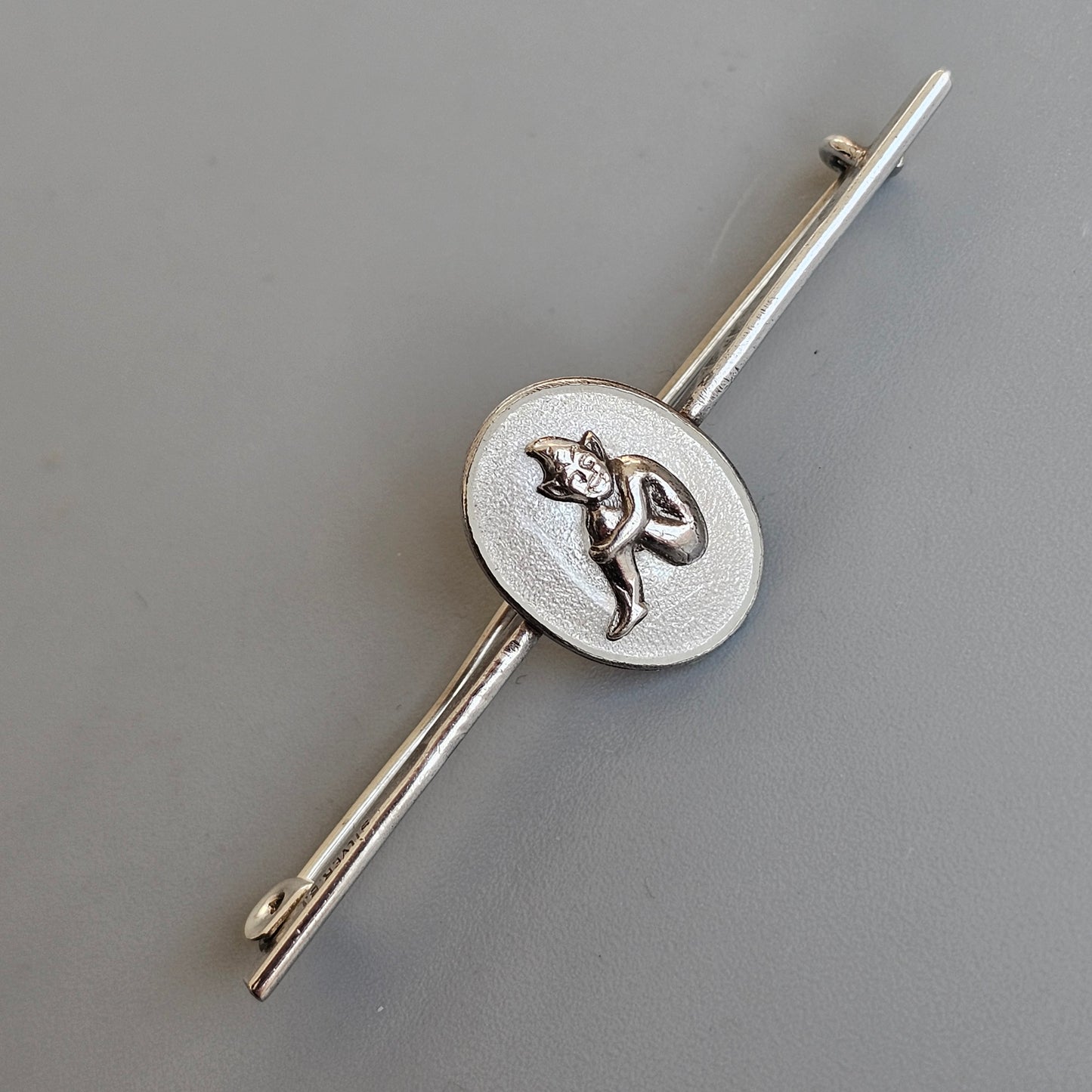 c1920s Bernard Instone Silver Pixie Bar Brooch with White Enamel – Vintage British Art Deco Jewelry