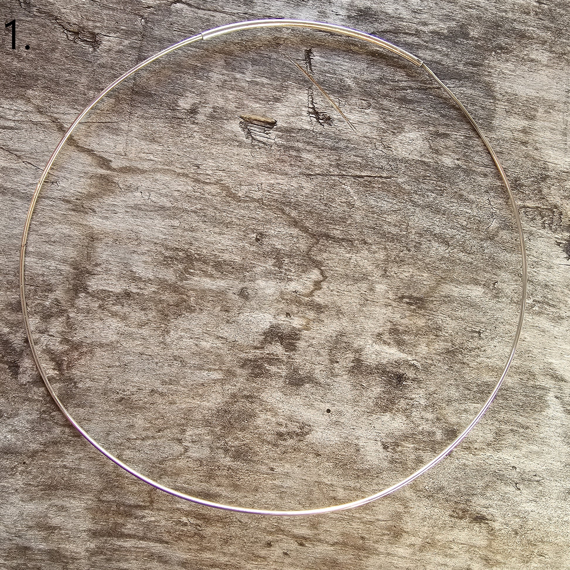 Thin circular metal ring or hoop.