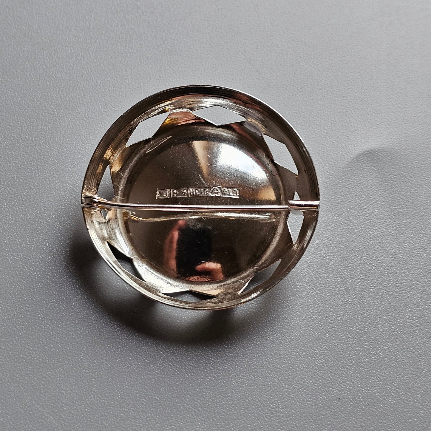 Clear glass or crystal sphere with an internal dividing line or equator.