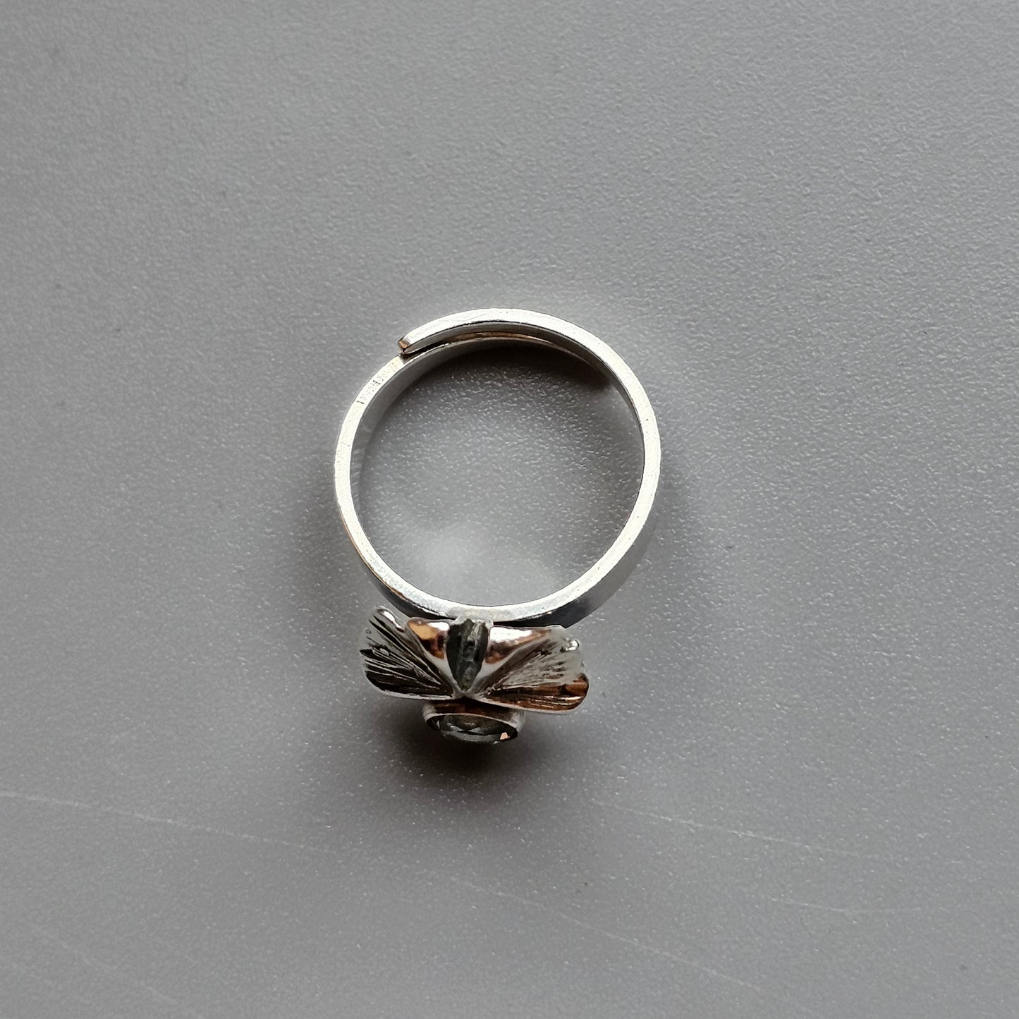 Silver ring with a flower-shaped setting.