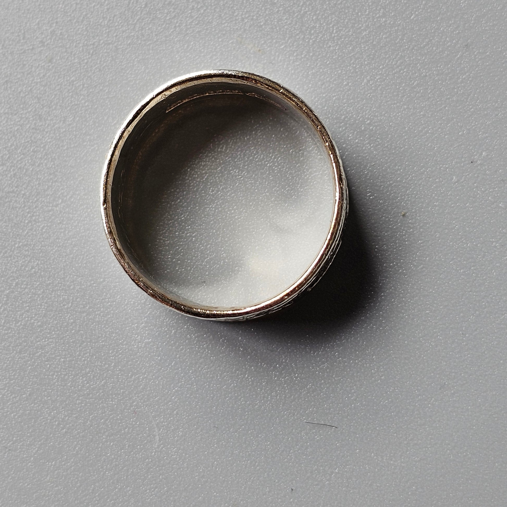 Simple metal ring or band with a plain, unadorned design.