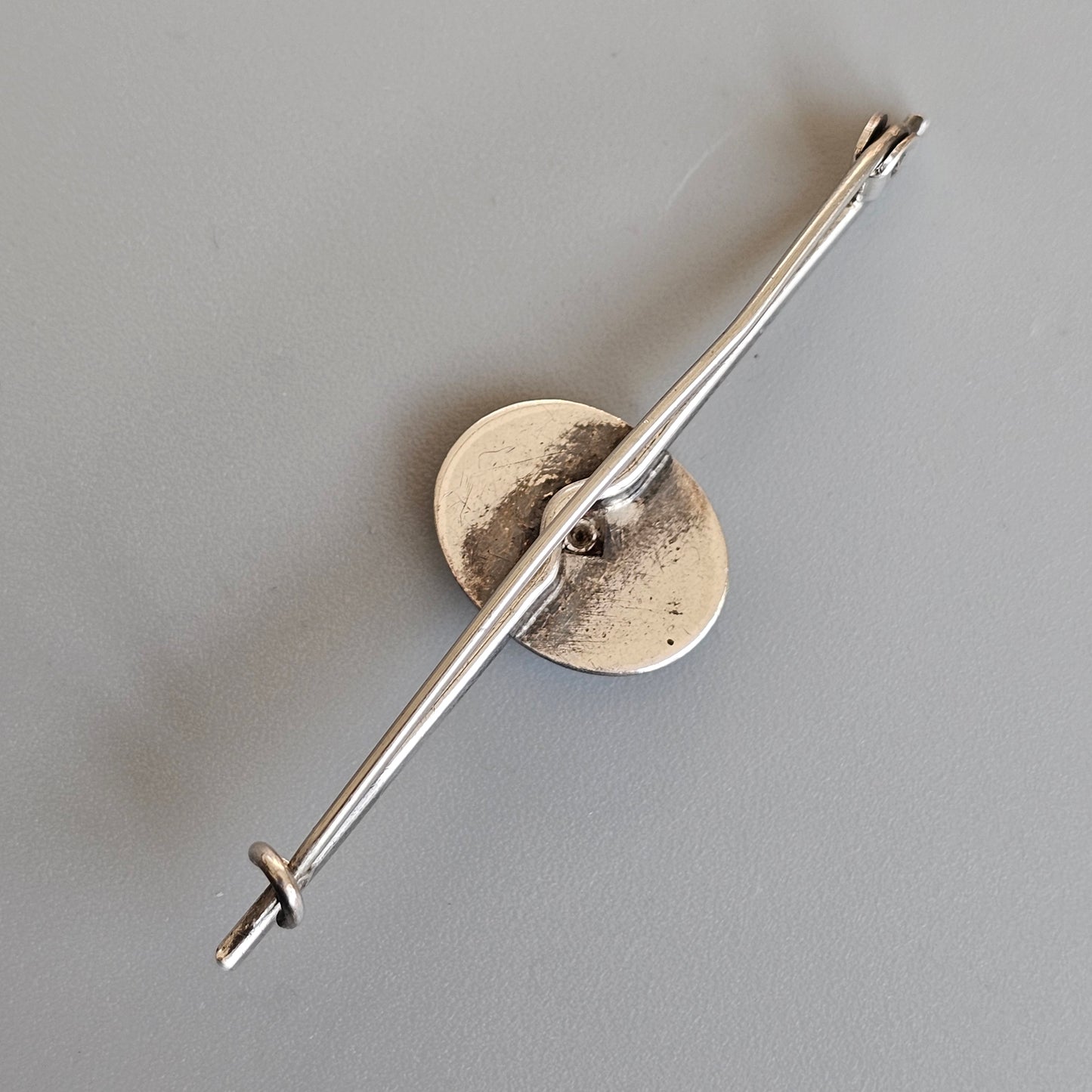 c1920s Bernard Instone Silver Pixie Bar Brooch with White Enamel – Vintage British Art Deco Jewelry