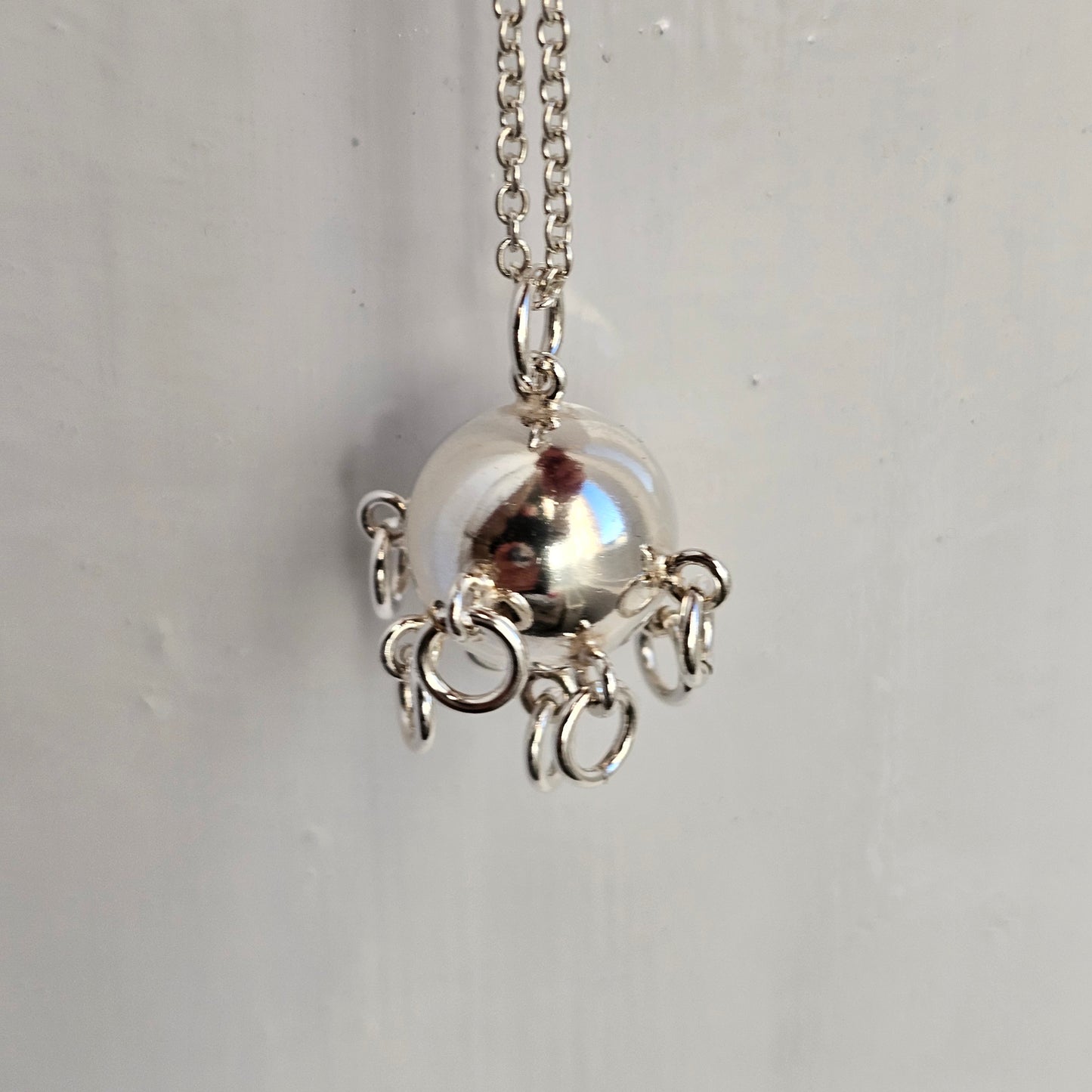 Finnish Silver Komsiopallo / Cradle Ball Necklace Pendant by Taiga Koru