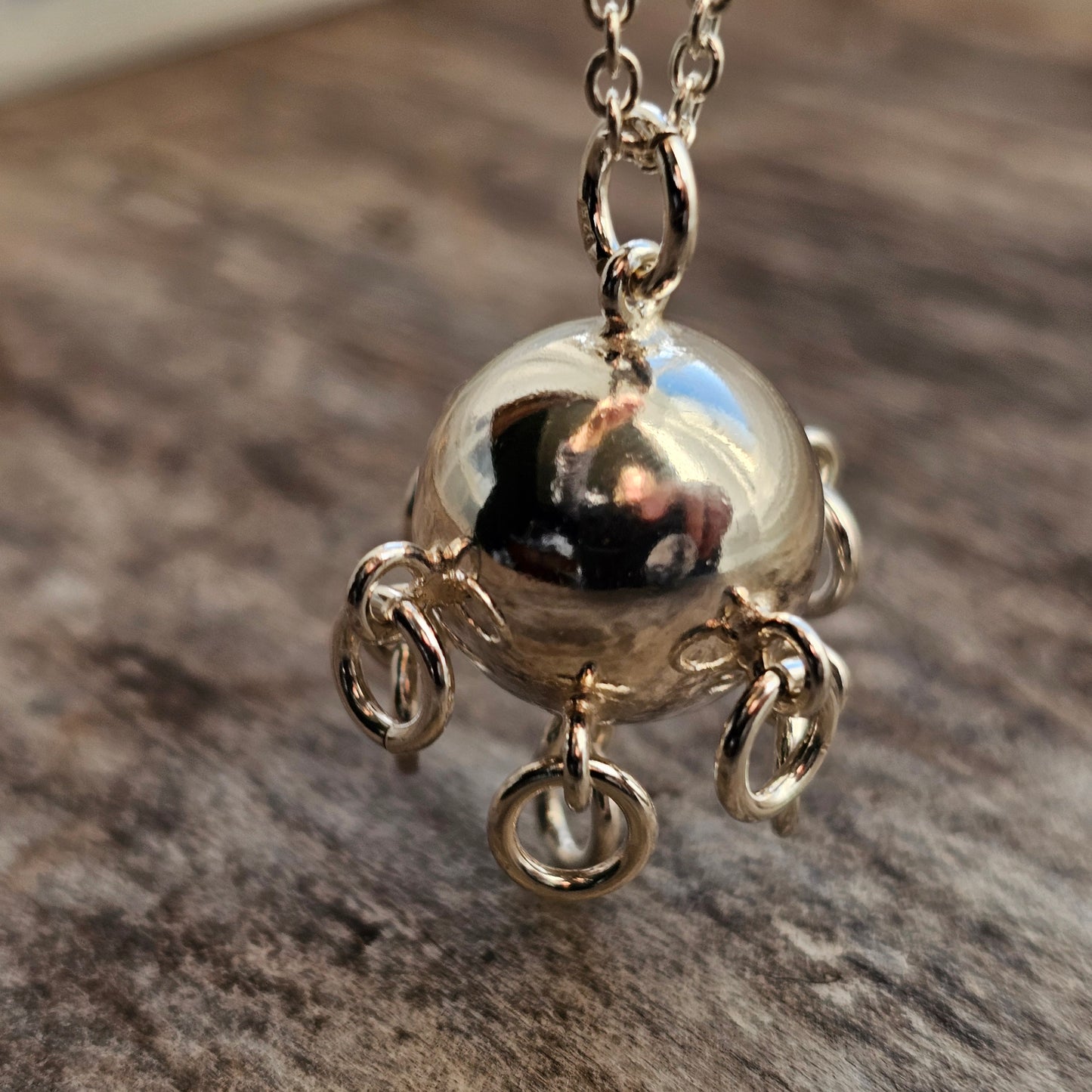 Finnish Silver Komsiopallo / Cradle Ball Necklace Pendant by Taiga Koru