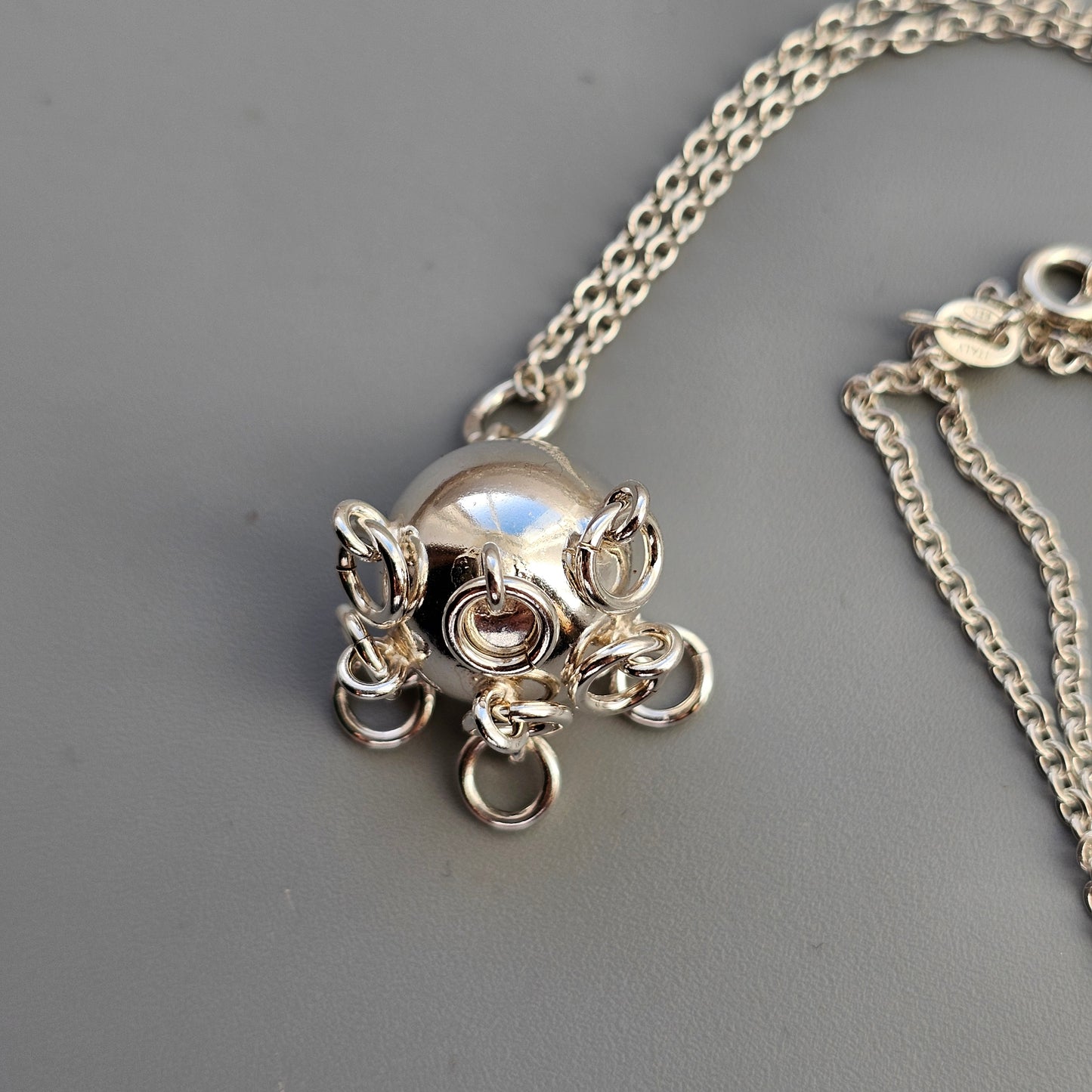 Finnish Silver Komsiopallo / Cradle Ball Necklace Pendant by Taiga Koru