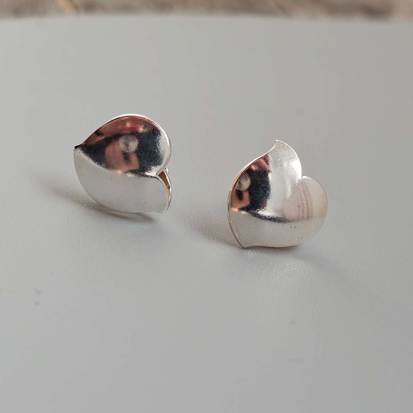 Lumoava Halaus Hug Sterling Silver Stud Earrings by Heikki Hartikainen