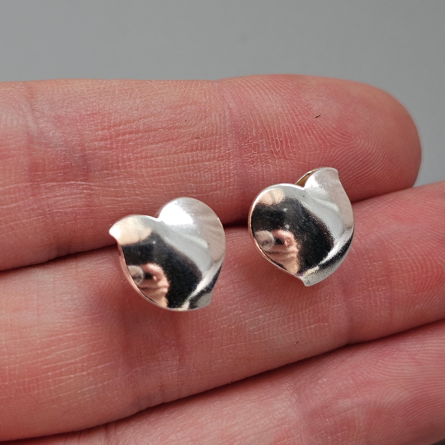Lumoava Halaus Hug Sterling Silver Stud Earrings by Heikki Hartikainen