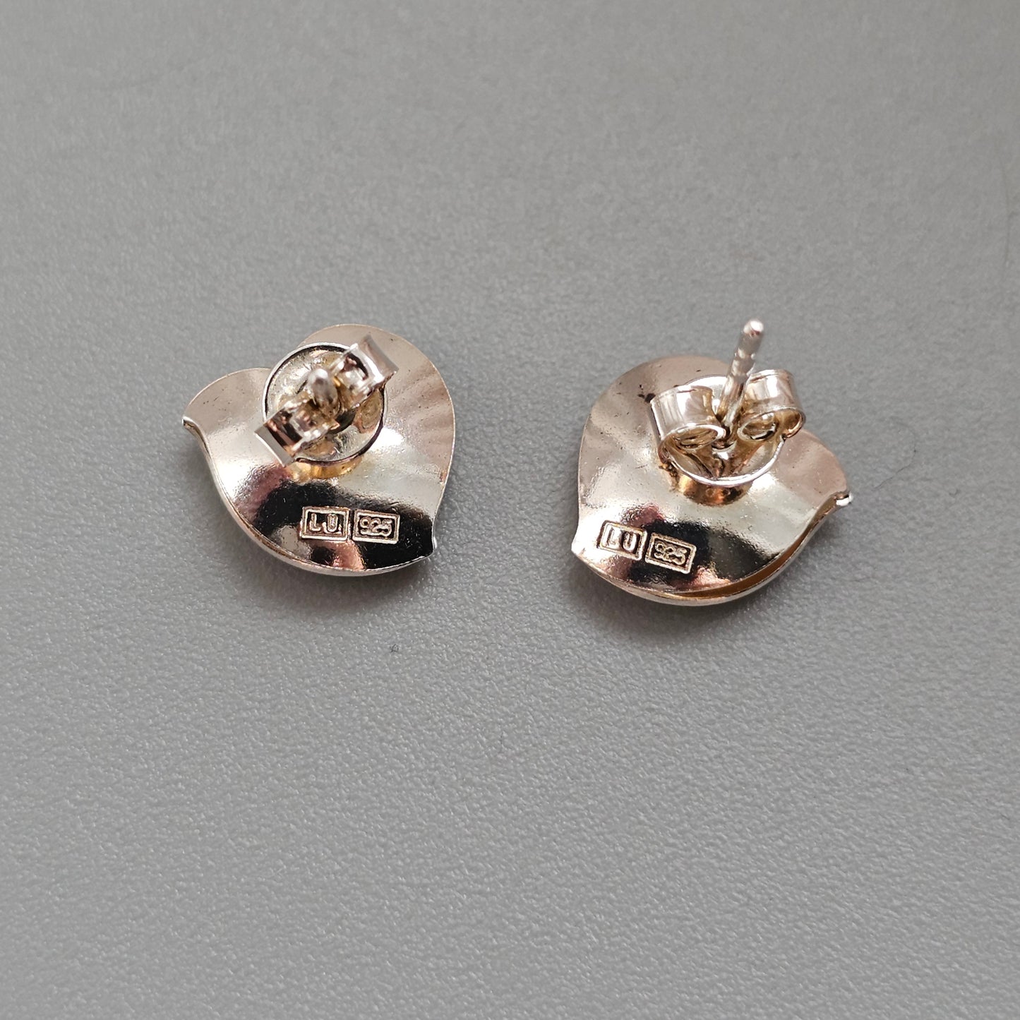 Lumoava Halaus Hug Sterling Silver Stud Earrings by Heikki Hartikainen