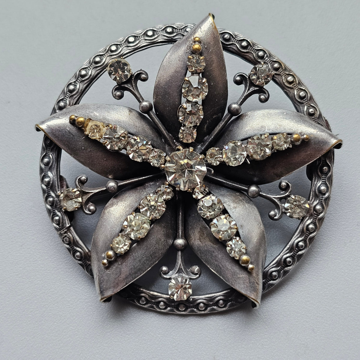 Vintage Nordic Folk Style Silver Tone Rhinestone Floral Brooch