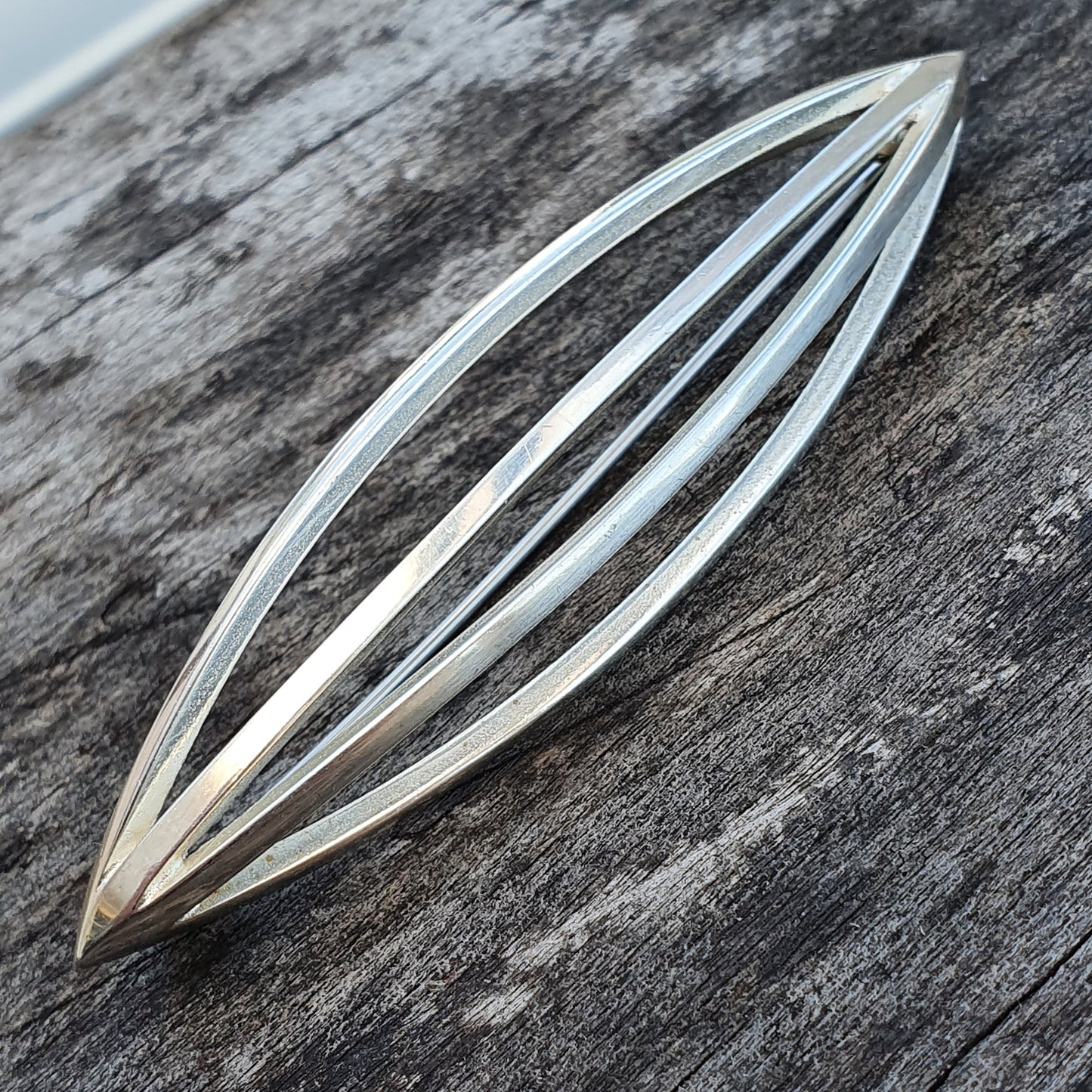 Elongated Finnish Silver Brooch by Kaunis Koru with overlapping oval shapes