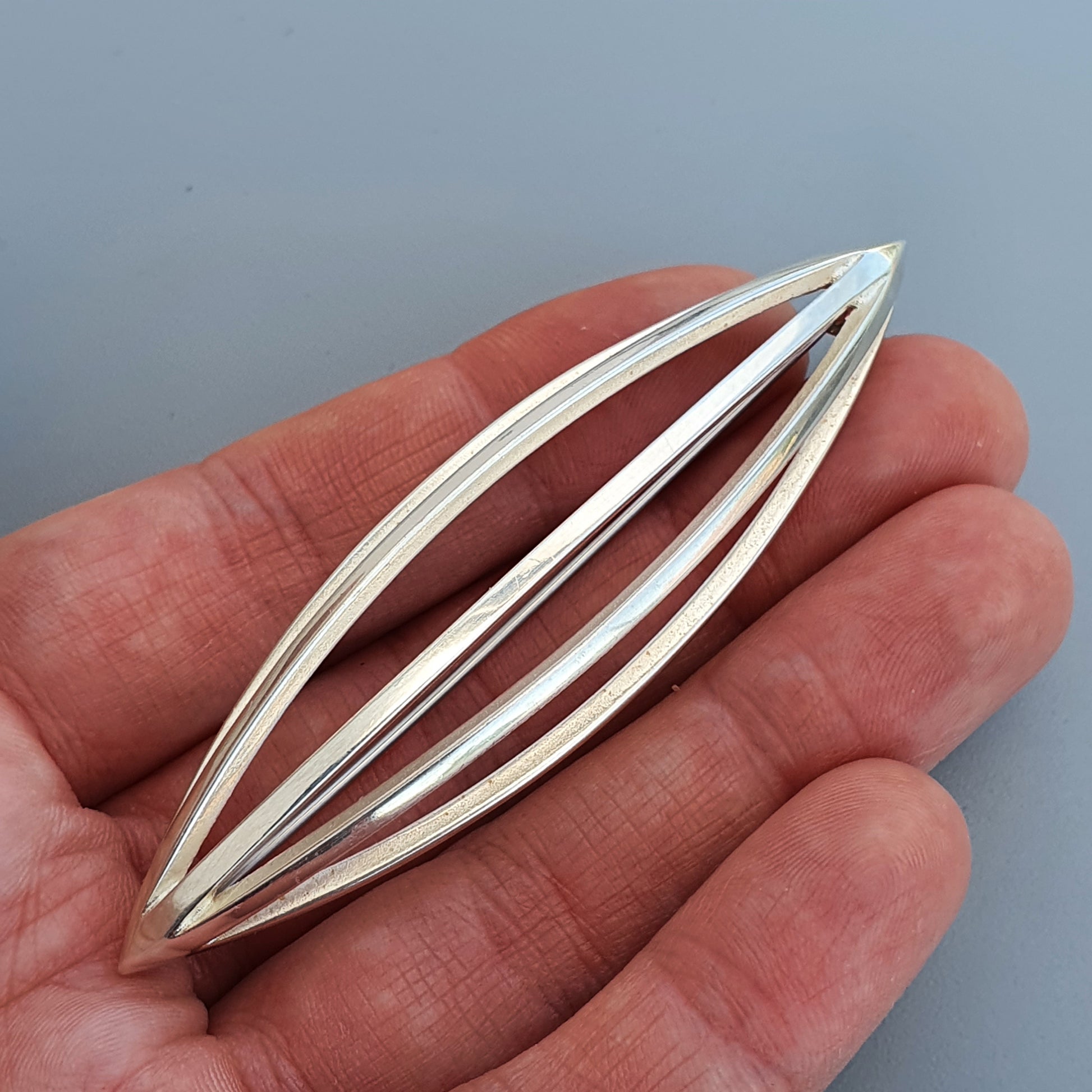 Elongated silver pendant with overlapping ovals from Kaunis Koru Finnish Silver Brooch