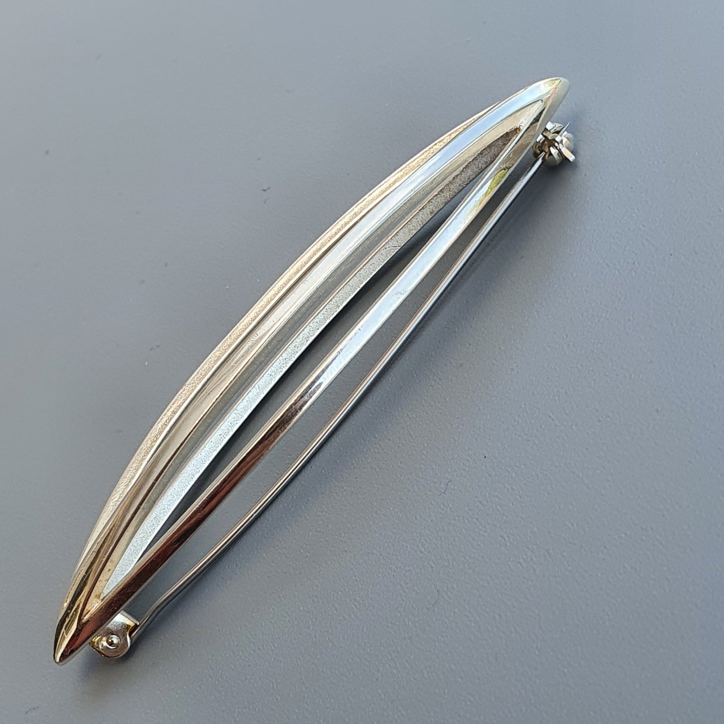 Sleek tapered Finnish Silver Brooch by Kaunis Koru with an elegant silver design